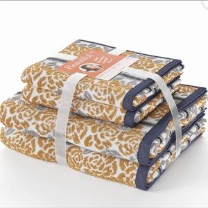 Beautiful by Drew Bath towel/hand towel/mat set in Amber Yellow wallpaper print